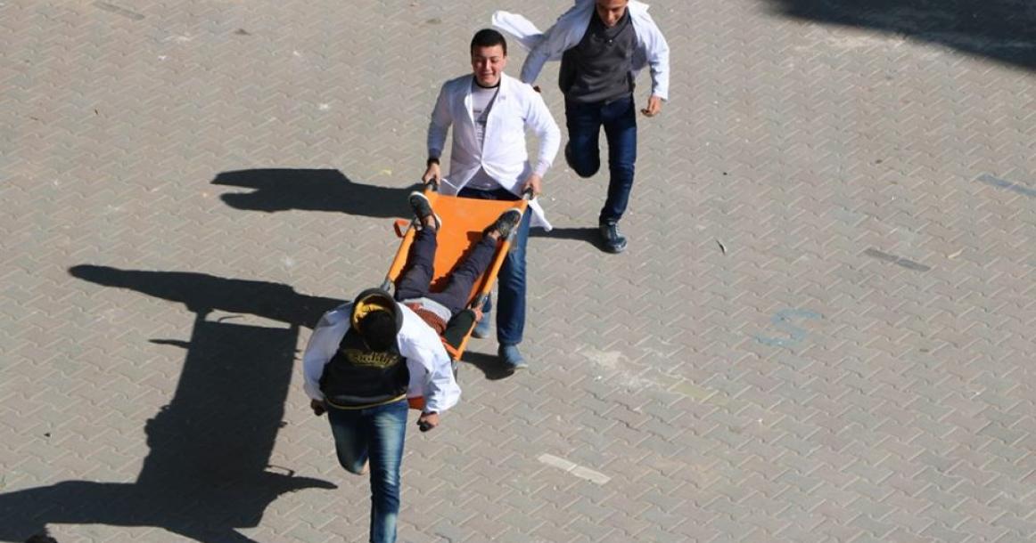 مناورة إخلاء مدرسة خالد بن الوليد بالنصيرات