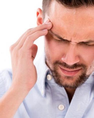 Man-experiencing-pain-from-frequent-headaches-630x400