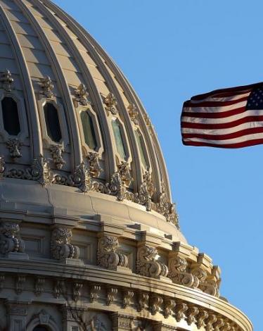 The last rays of sunlight fall on the dome of the U.S. Capitol 