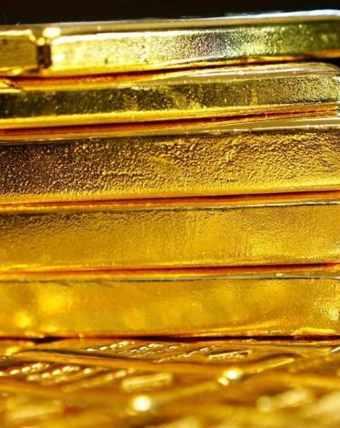 هبوط للذهب مع صعود الدولار الأميركي