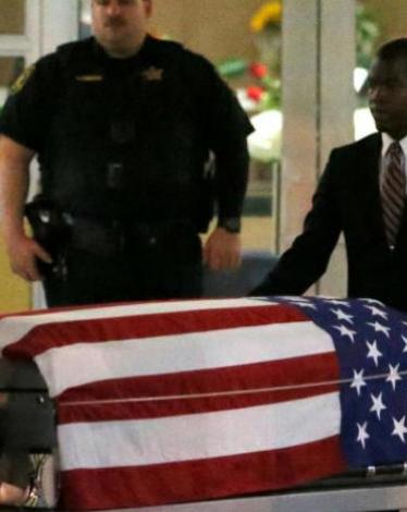 2017-10-20T233818Z_111214137_RC1D7C2F0600_RTRMADP_3_USA-TRUMP-FALLEN-SOLDIER