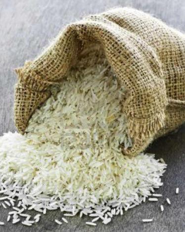 6121221-raw-long-grain-white-rice-grains-in-burlap-bag