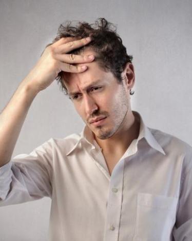 man-with-headache-fotolia_350640962