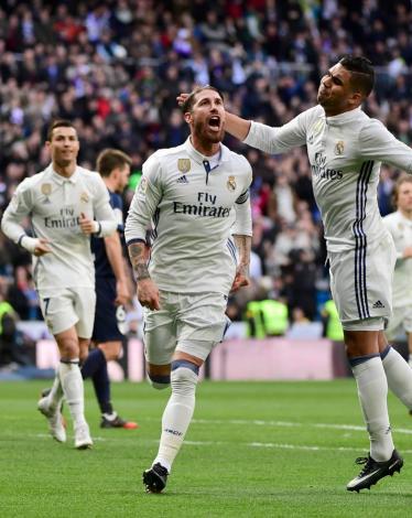 ريال مدريد يفلت من فخ مالاجا بثنائية راموس