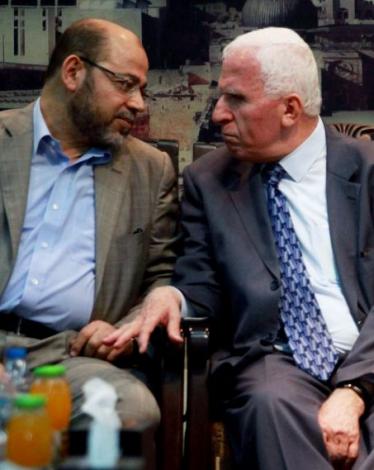 عزام الأحمد وموسى أبو مرزوق