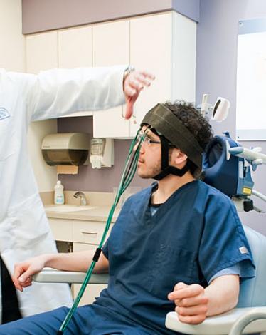 Transcranial-magnetic-stimulation-is-used-to-monitor-activity-in-the-prefrontal-lobe-of-the-brain