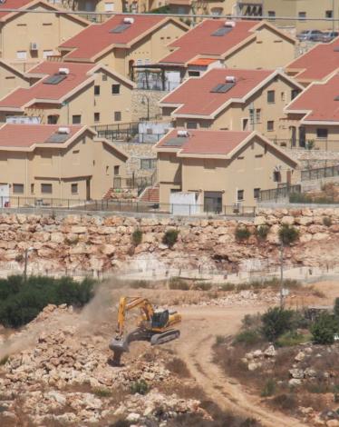 Israeli-bulldozers-working-in-the-Israeli-settlement