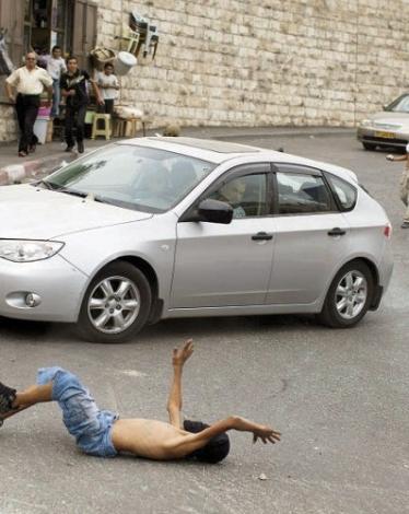 1459176127os2603201405-مستوطن-يدهس-800x500