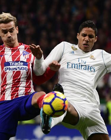 antoine-griezmann-raphael-varane-atletico-madrid-real-madrid_12os2hf7ggszy1t52cfd5ueuv2