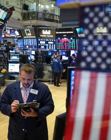 كيف تأثرت الأسواق العالمية برفع الفائدة الأمريكية؟