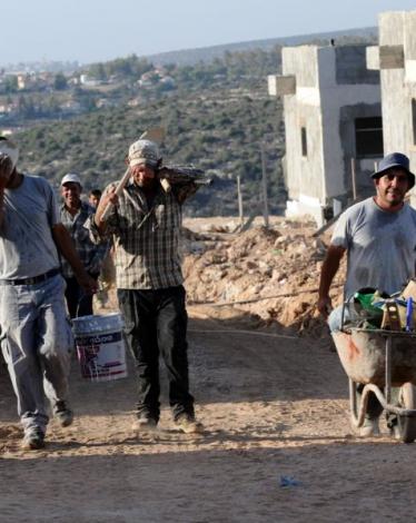 عمال فلسطينيين في "إسرائيل"