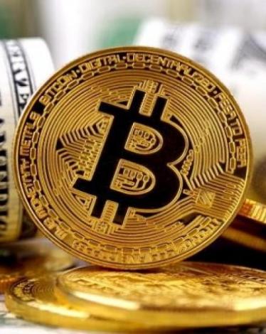 "بيتكوين" تقفز قرب أعلى مستوى تاريخي لها