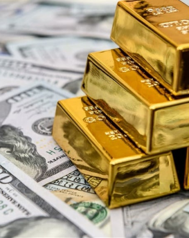 ارتفاع الدولار يُخفض أسعار الذهب