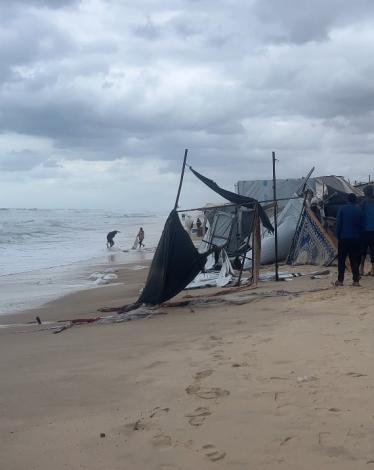 tents damaged gaza sea.jpg