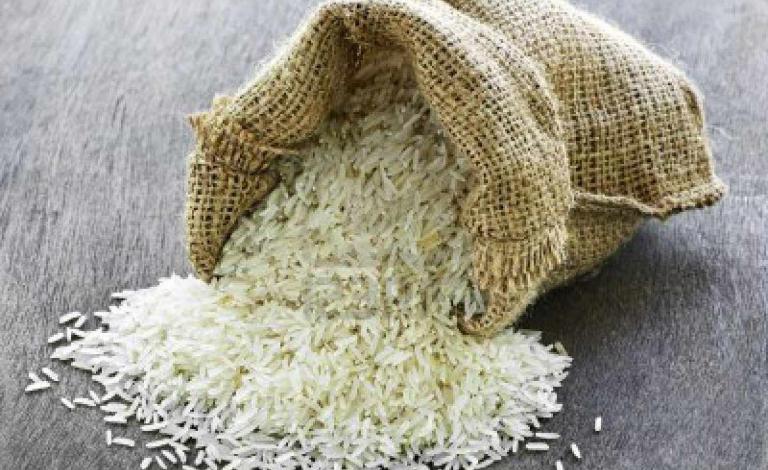 6121221-raw-long-grain-white-rice-grains-in-burlap-bag
