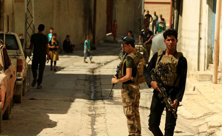اشتباكات بين فصائل مساندة للقوات العراقية
