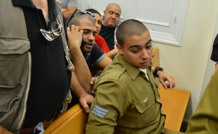 الجندي قاتل الشهيد الشريف