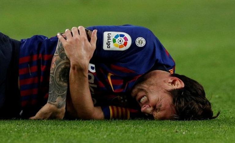 124-000439-messi-injury-against-sevilla_700x400