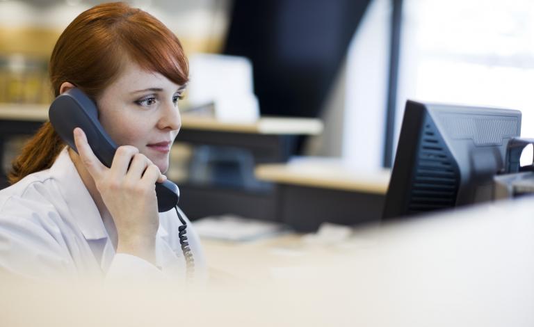 female-receptionist-talking-on-phone-1