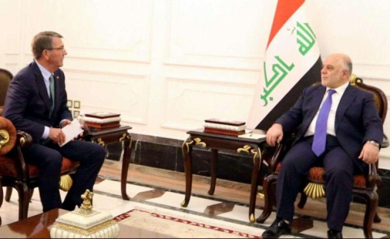 العبادي وكارتر خلال لقائهما ببغداد