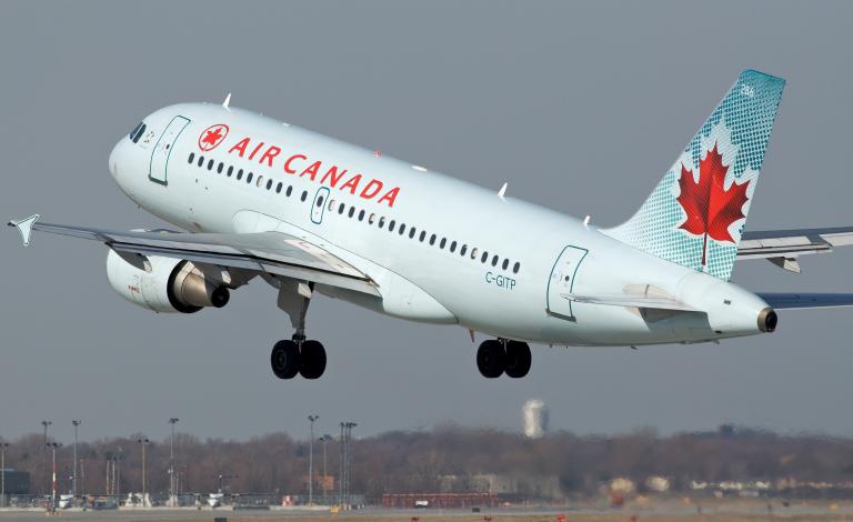 Air_Canada_A319_C-GITP_departing_YUL