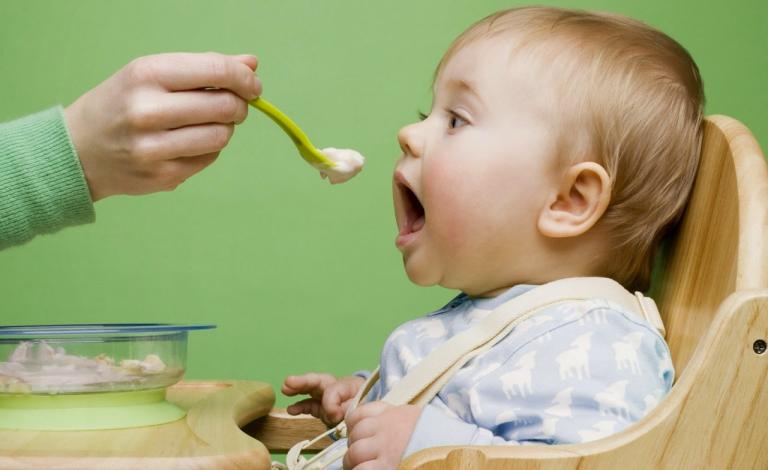 child-cereal-dish-hand-concern