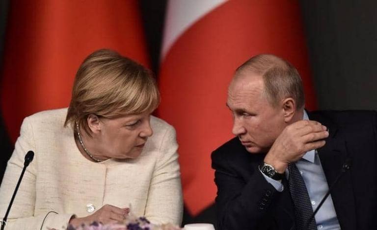 فلاديمير بوتن وأنغيلا ميركل في لقاء سابق