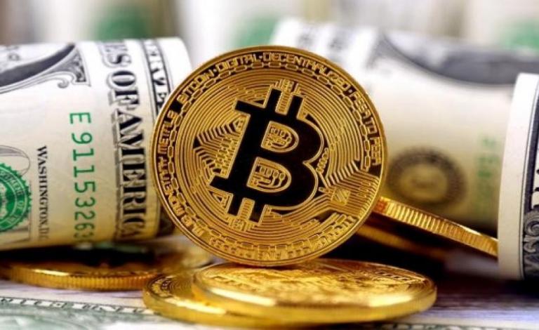 "بيتكوين" تقفز قرب أعلى مستوى تاريخي لها