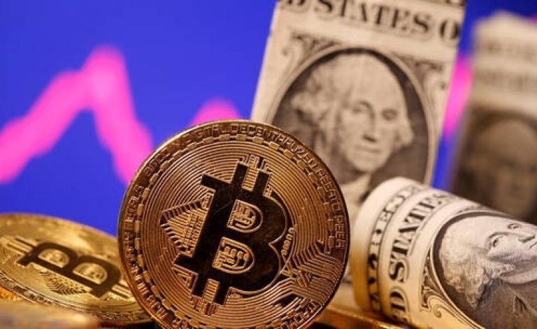 لأول مرة.. "بيتكوين" تتخطى عتبة الـ60 ألف دولار