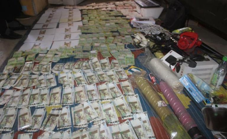 تزييف عملات في السودان
