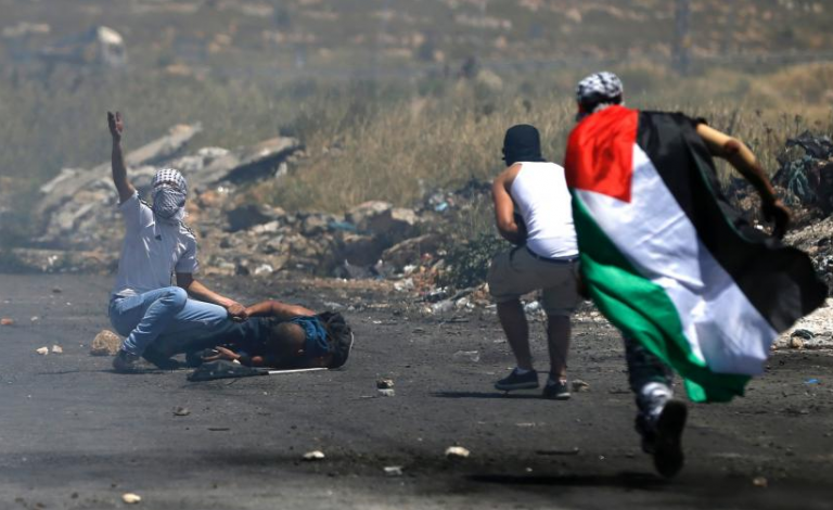 9 إصابات برصاص الاحتلال شمال البيرة