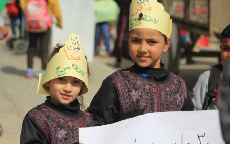 اللجنة-الشعبية-للاجئين-تحيى-يوم-الارض-بمسيرة-لاطفال-الرياض-بالنصيرات-11