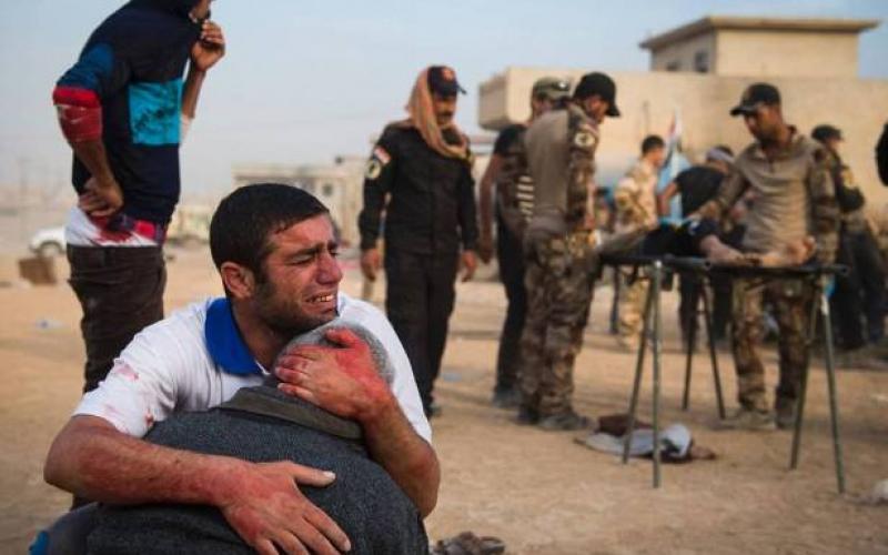 3B569DE500000578-4029044-Father_and_grandfather_of_15_year_old_Shafiq_mourn_as_Iraqi_forc-a-23_1481662683341_874441_large