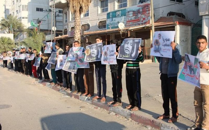 بالصور: وقفة بالوسطى تضامناً مع "اليرموك"