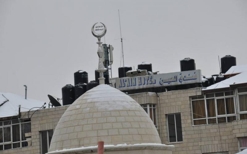 صور: الثلوج تكتسي رام الله