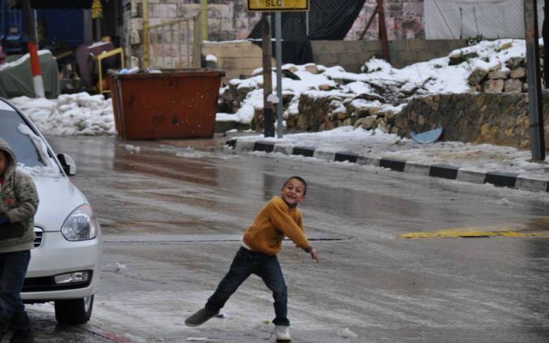 صور: الثلوج تكتسي رام الله