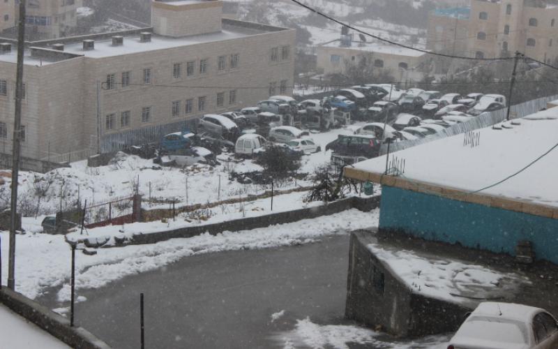صور: تجدد تساقط الثلوج على الخليل