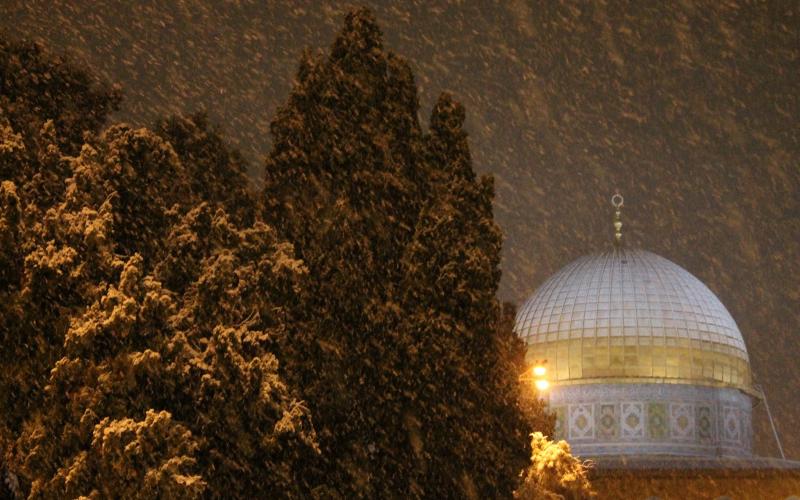 صور: "الأقصى" يكتسي بحلة جديدة من الثلج