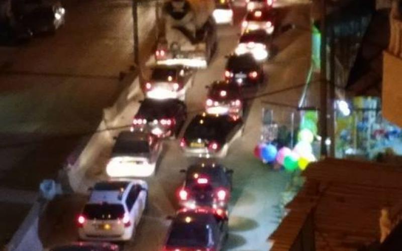 بالصور: حاجز قلنديا.. بوابة "جحيم" ينتظر زوالها