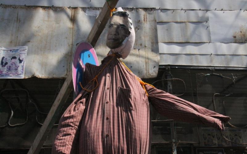بالصور: "حماس" تنظم وقفة احتجاجية على زيارة أوباما