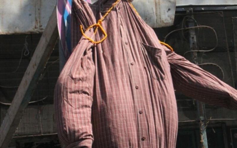 بالصور: "حماس" تنظم وقفة احتجاجية على زيارة أوباما