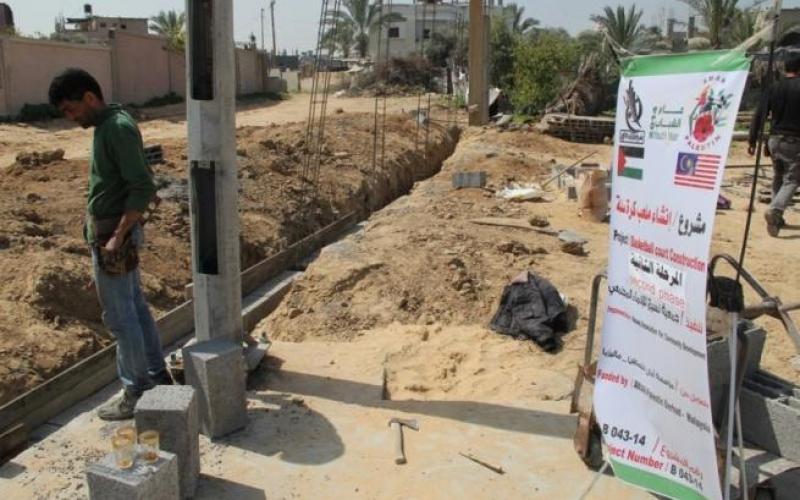 "نسيج" تستكمل مشروع ملعب السلة بالمغازي