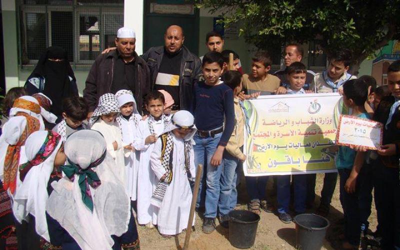 بالصور: "تنمية الأسرة" تحيي يوم الأرض