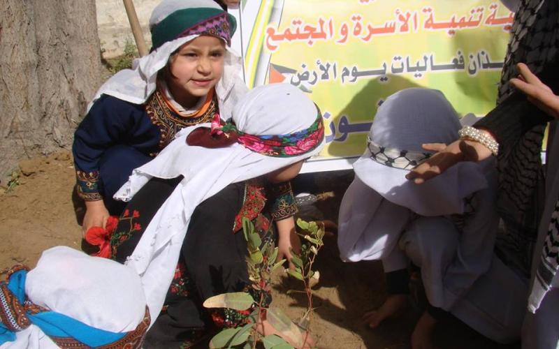 بالصور: "تنمية الأسرة" تحيي يوم الأرض