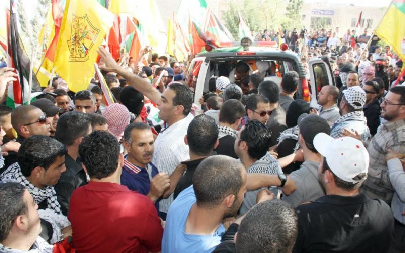 بالصور والفيديو: الآلاف يستقبلون الشهيد أبو حمدية في "أبو ديس"