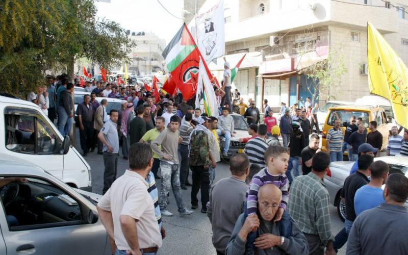 بالصور والفيديو: الآلاف يستقبلون الشهيد أبو حمدية في "أبو ديس"