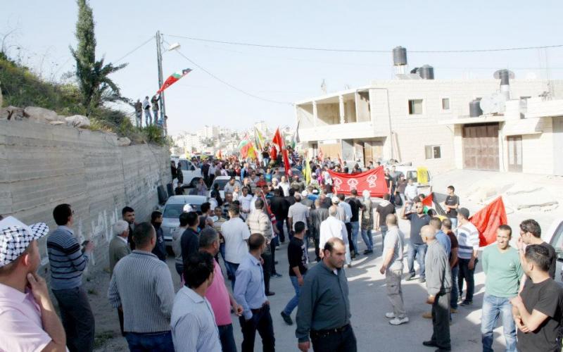 بالصور والفيديو: الآلاف يستقبلون الشهيد أبو حمدية في "أبو ديس"