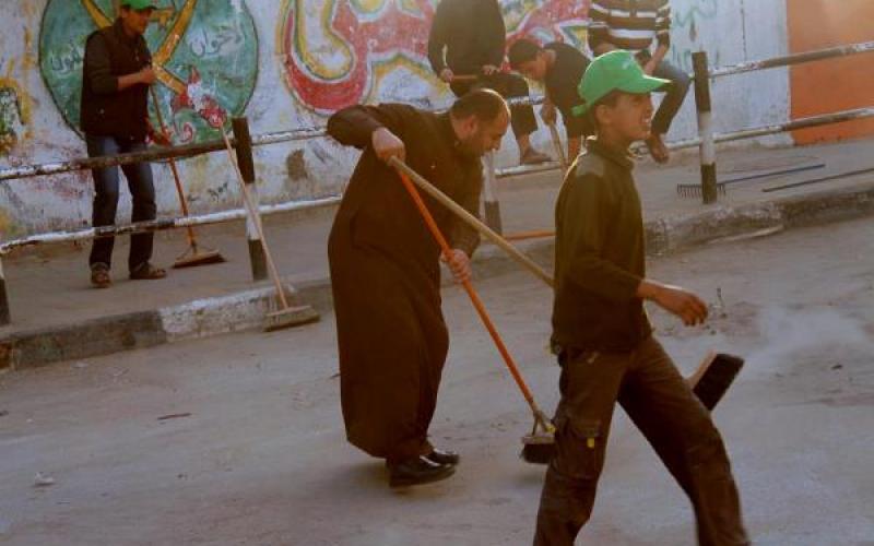 بالصور: حماس تنفذ حملة تطوعية للنظافة بالشجاعية