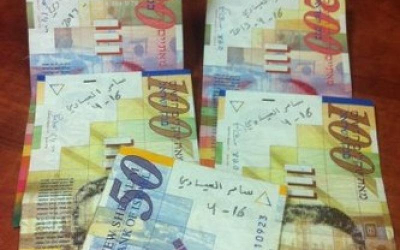 صور: اسم العيساوي على الأوراق النقدية