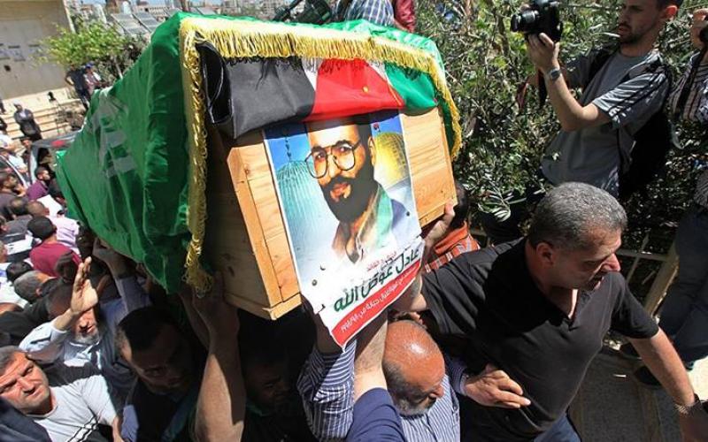 صور: جماهير غفيرة تشيع جثماني "عوض الله"